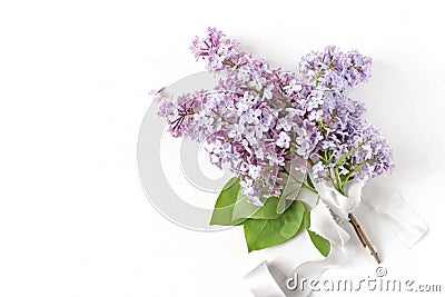 Styled stock photo. Spring wedding, birthday scene, floral composition. Bouquet made of beautiful blossoming purple Stock Photo