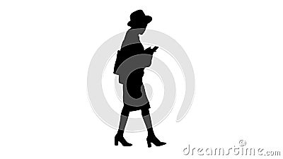 Stylish african american woman in knitwear and hat using her pho Stock Photo