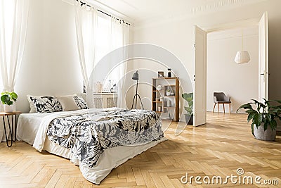 Stylish apartment interior with white walls and herringbone wood Stock Photo