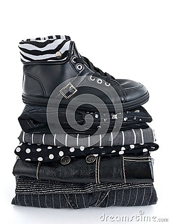 Stylish black clothes and a leather boot Stock Photo