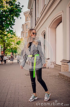 Stylish blogger posing on the street Stock Photo