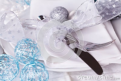 Stylish blue and silver Christmas table setting Stock Photo