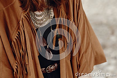 Stylish boho woman look. gypsy hipster girl in fringe jacket wit Stock Photo