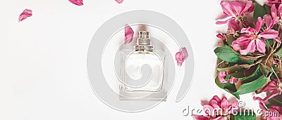 Stylish bottle of perfume of flowers on white background. creative trendy flat lay with copy space. top view. perfumery and floral Stock Photo