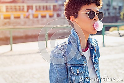 Stylish brazilian girl with bubble gum Stock Photo