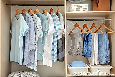 Stylish clothes on hangers Stock Photo