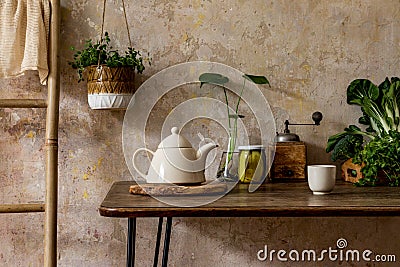 Stylish composition of kitchen interior with family table, vegetables, tea pot, dessert, food supplies, plants . Stock Photo