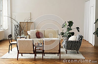 The stylish composition at living room interior with design beige sofa, glass coffee table, chairs, plants and elegant Editorial Stock Photo
