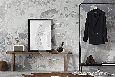 The stylish compostion at living room interior with mock up, concrete wall, bench, hanger with clothes and elegant personal Stock Photo