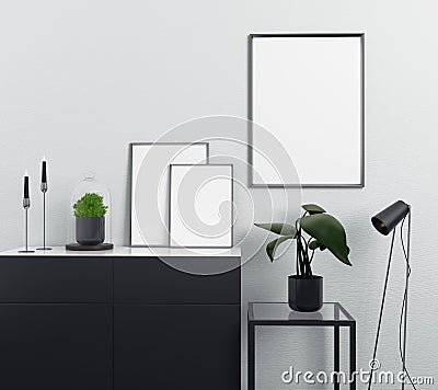 Stylish cupboard with empty picture frames Stock Photo