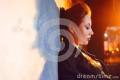 Stylish and daring brunette in black, portrait Stock Photo