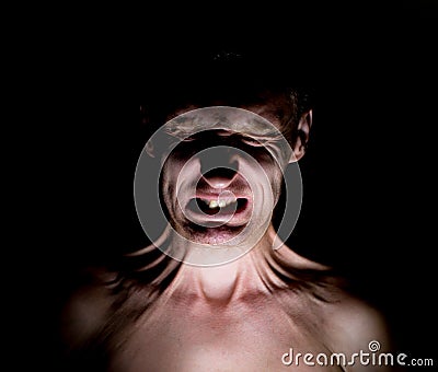 Stylish dark humorous portrait of adult caucasian man who funny wrinkles his face Stock Photo