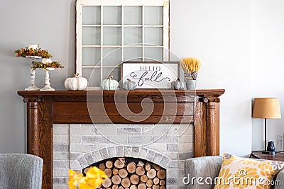 Stylish fall decorations on the mantel Stock Photo