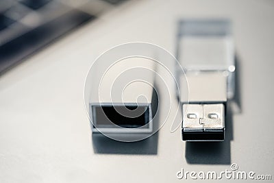 Stylish Flash Drive. glass card on a gray background. Stock Photo