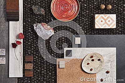 Stylish flat lay composition of architect moodboard with samples of building, brown textile and natural materials and personal. Stock Photo