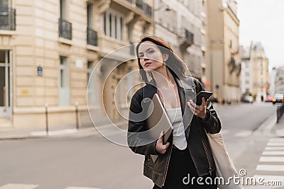 stylish freelancer in black leather jacket Stock Photo