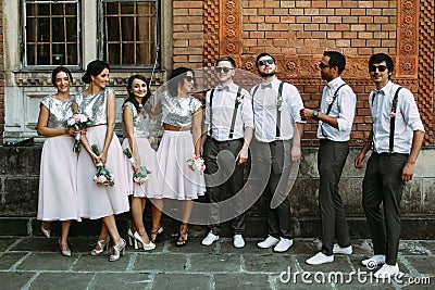 Stylish groomsmen and beautiful bridesmaids Stock Photo