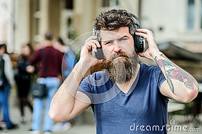Stylish and handsome music lover. business ebook online. Ebook holds much that is important to me. Face the music Stock Photo