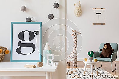 Cute interior of kid room with baby accessories and toys. Stock Photo