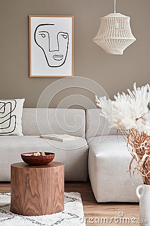 Stylish interior with design neutral modular sofa, mock up poster frames, coffee table, book, decoration, ceramic vessel. Stock Photo