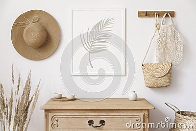 Stylish korean interior of living room with mock up poster frame, elegant accessories, dried flowers in vase, wooden shelf. Stock Photo