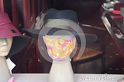 Stylish lady hat with anti corona mask Editorial Stock Photo