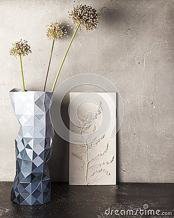 Stylish living room interior with botanical bas-relief wildflowers for wall artand flowers in vase. 3D Flower plaster decor. Stock Photo