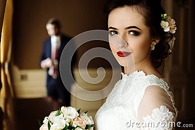Stylish luxury bride and handsome elegant groom on the backgrou Stock Photo