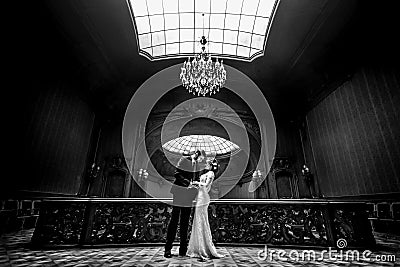 Stylish luxury bride and handsome elegant groom dancing on the b Stock Photo