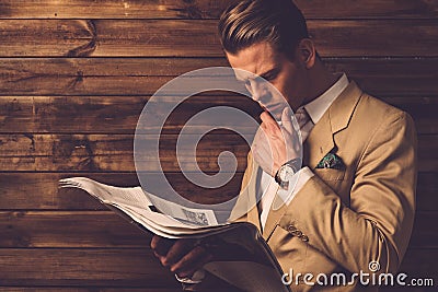 Stylish man with newspaper Stock Photo