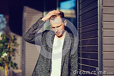 Stylish man posing in autumn coat Stock Photo