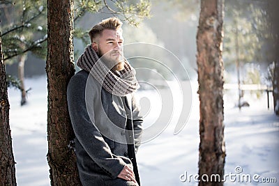 Stylish man in winter scenery Stock Photo
