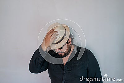 Stylish mexican man wearing sombrero and sunglasses Stock Photo