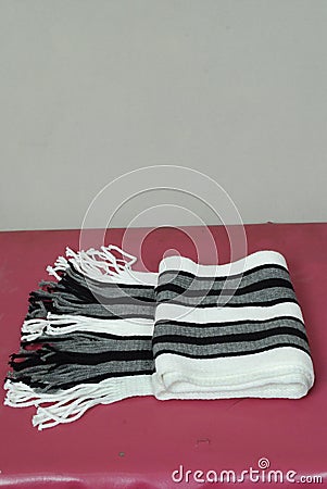 Stylish modern woolen grey,black and white contrast scarf Stock Photo