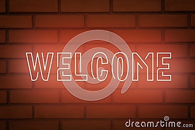 Stylish neon sign WELCOME on brick wall Stock Photo