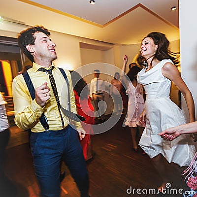 Stylish retro bride and groom dancing first wedding dance swing Stock Photo