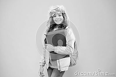 Stylish schoolgirl. Girl little fashionable schoolgirl carry backpack. Schoolgirl daily life. Modern education. Final Stock Photo