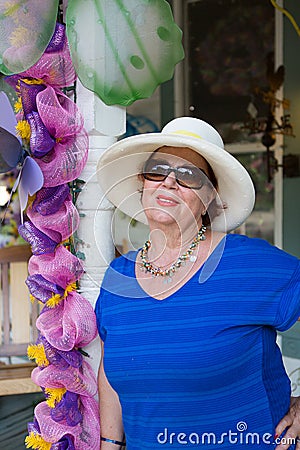 Stylish senior woman in sunglasses Stock Photo