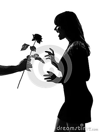 Stylish silhouette man hand offering a flower rose Stock Photo