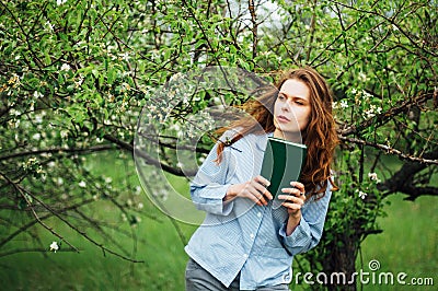 Stylish spring bohemian outfits. Beautiful young woman with long Stock Photo