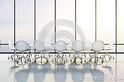 Stylish sunny meeting room with transparent conference table, white chairs and transparent wall instead window Stock Photo