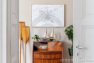 Vintage, wooden commode, plants and stylish interior accessories. Stock Photo