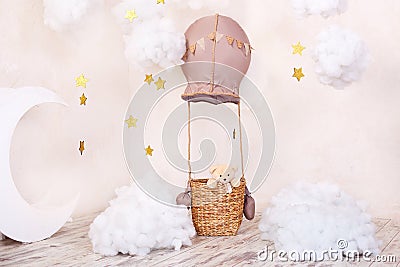 Stylish vintage kids room with aerostat, moon and clouds. Little traveler. Room for children to play. The concept of childhood, im Stock Photo