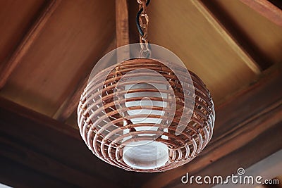 Stylish vintage round chandelier made of rattan Stock Photo