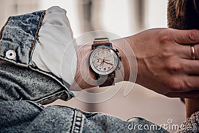 Stylish casual watch on man hand Stock Photo