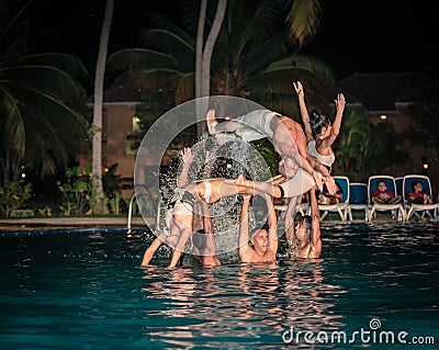 Stylish water show performed by a high passionate professional Cuban dancers Editorial Stock Photo