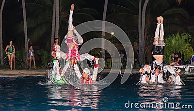 Stylish water show performed by a high passionate professional Cuban dancers Editorial Stock Photo