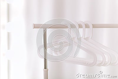 Stylish white hangers Stock Photo