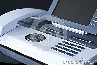 Stylish white office phone Stock Photo