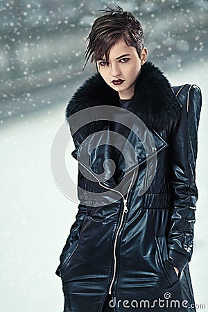 Stylish woman in leather coat Stock Photo